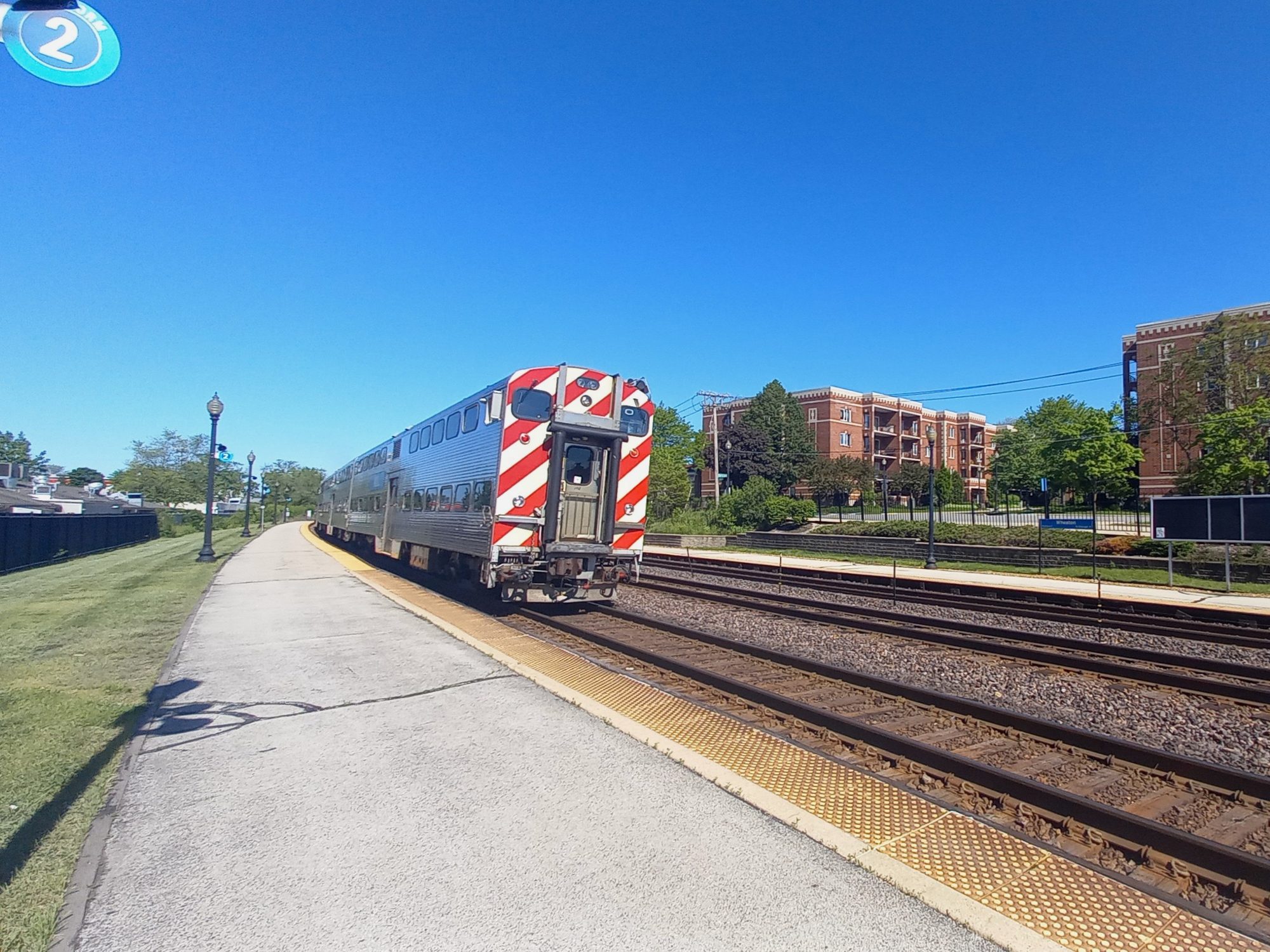 Metra UPW outbound train at Wheaton station