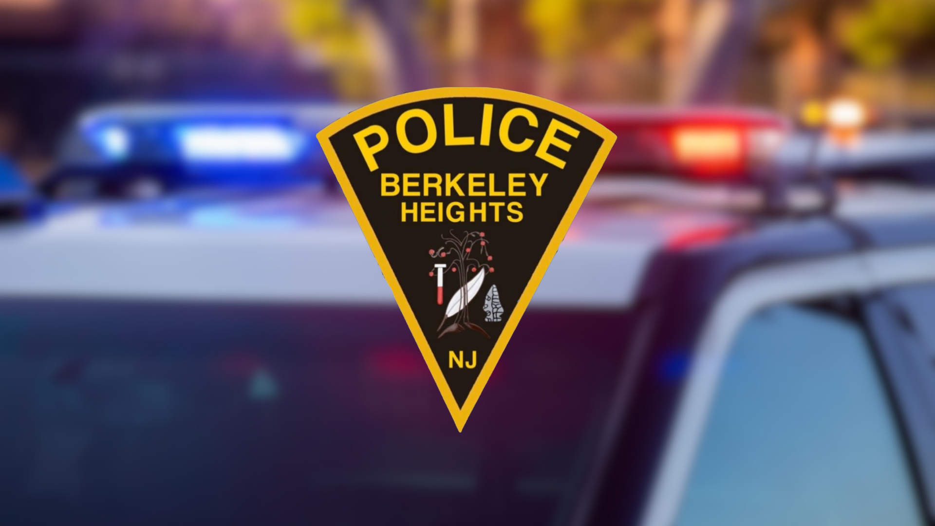 Berkeley Heights PD NJ Badge Logo on blurred police vehicle background.