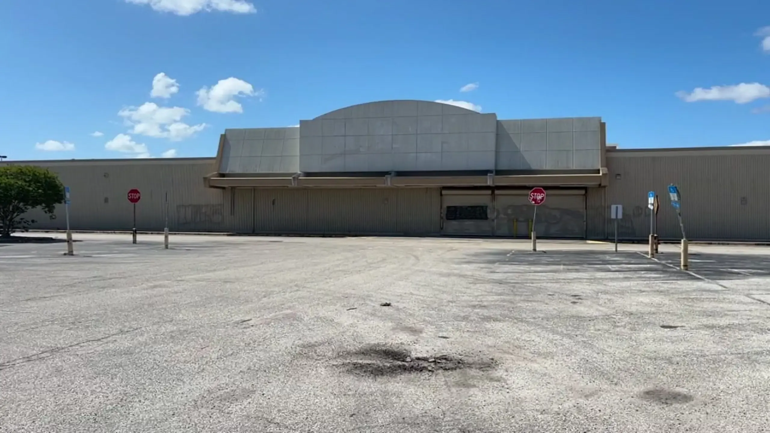 Vacant former Kmart storefront and parking lot at 500 Atlantic Boulevard in Neptune Beach, the proposed Town Center West redevelopment site.