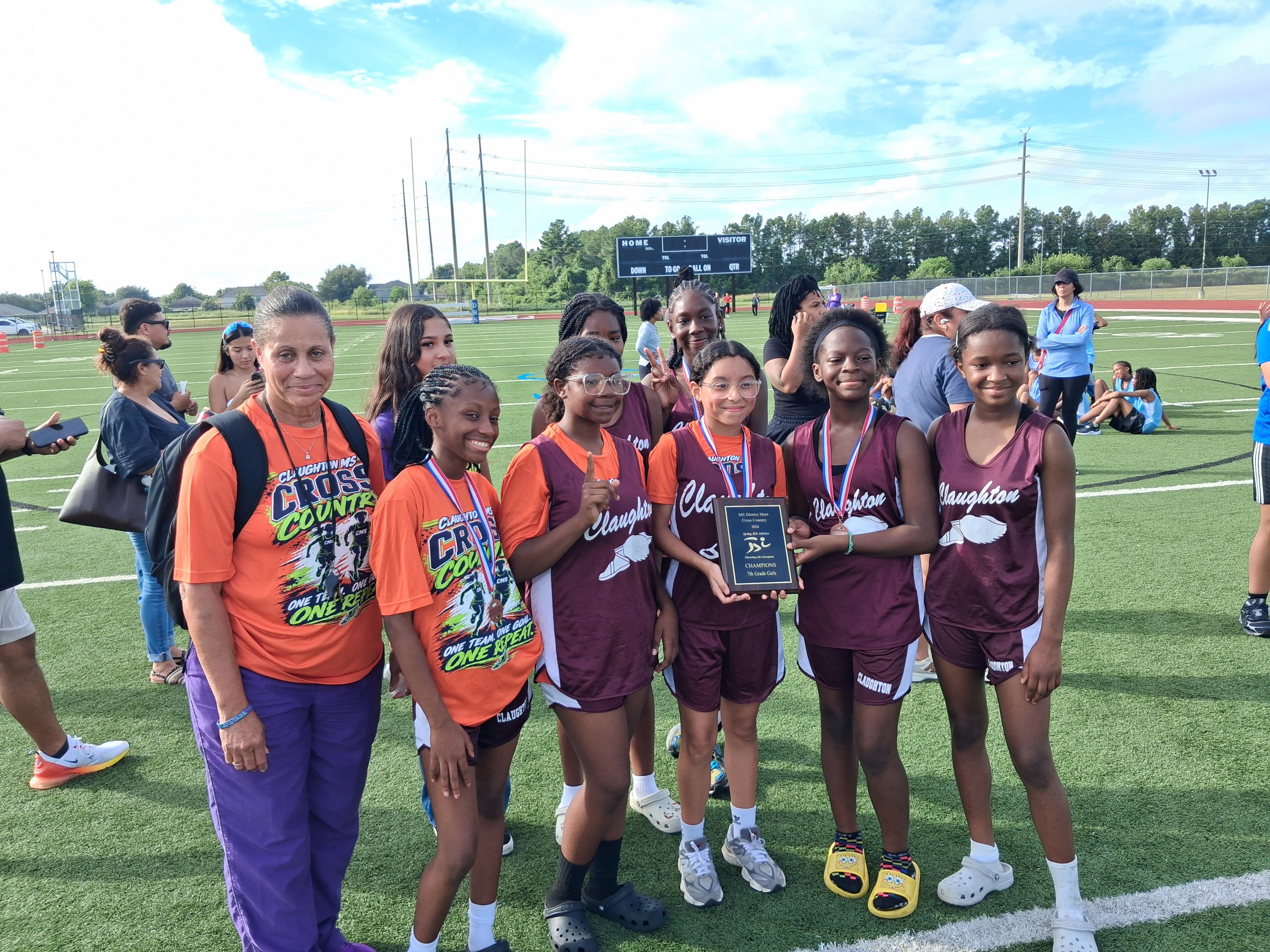 Claughton 7th grade girls for claiming the district cross country team championship