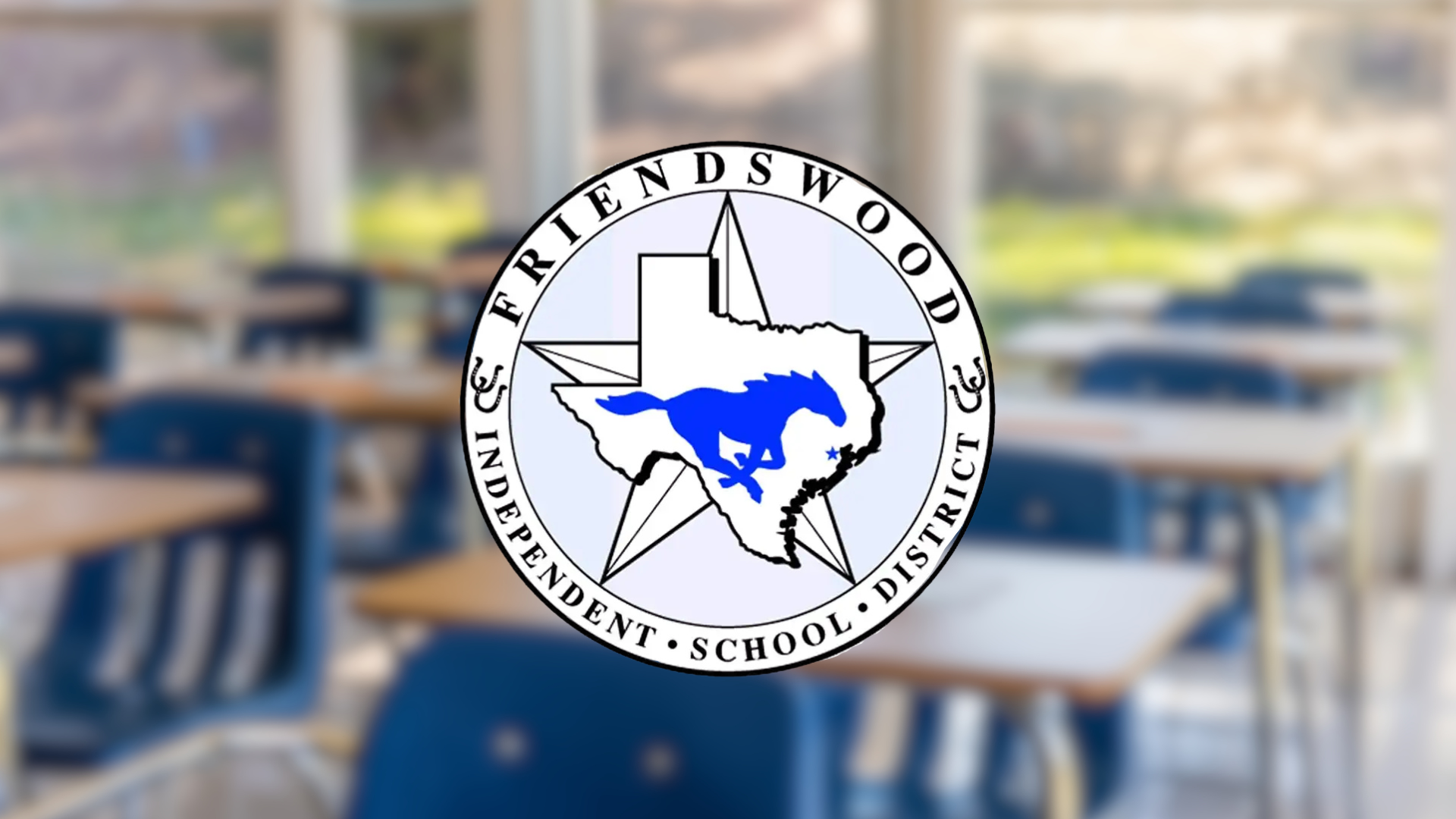 Friendswood ISD Logo on empty school classroom blurred background