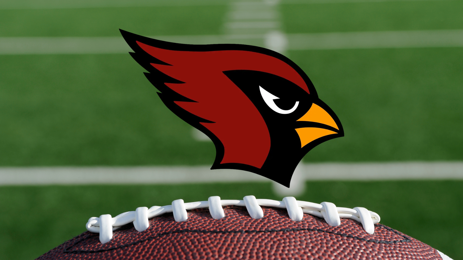 Greenwich CT logo on blurred football background.