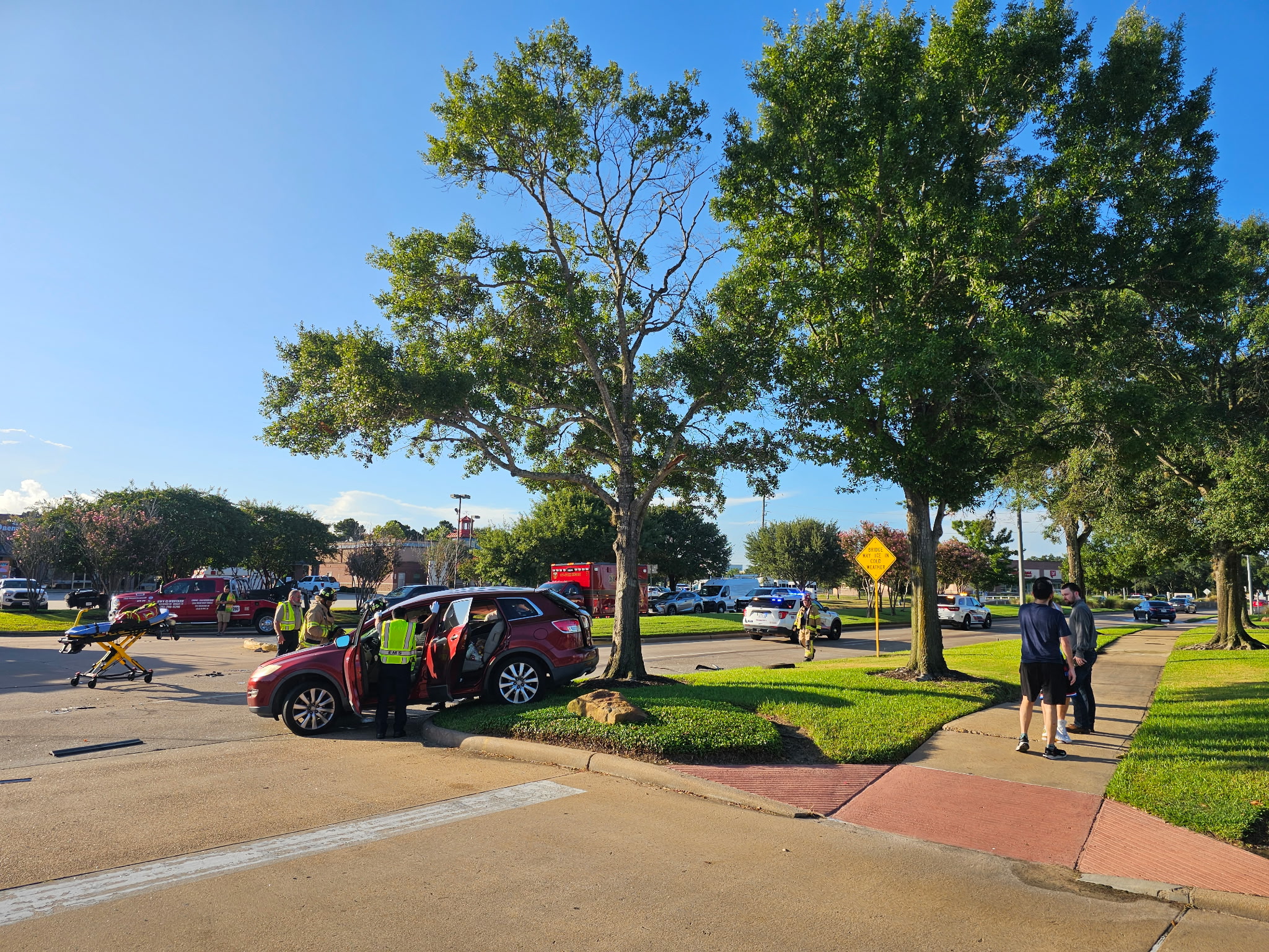 First responders on scene of car crash.