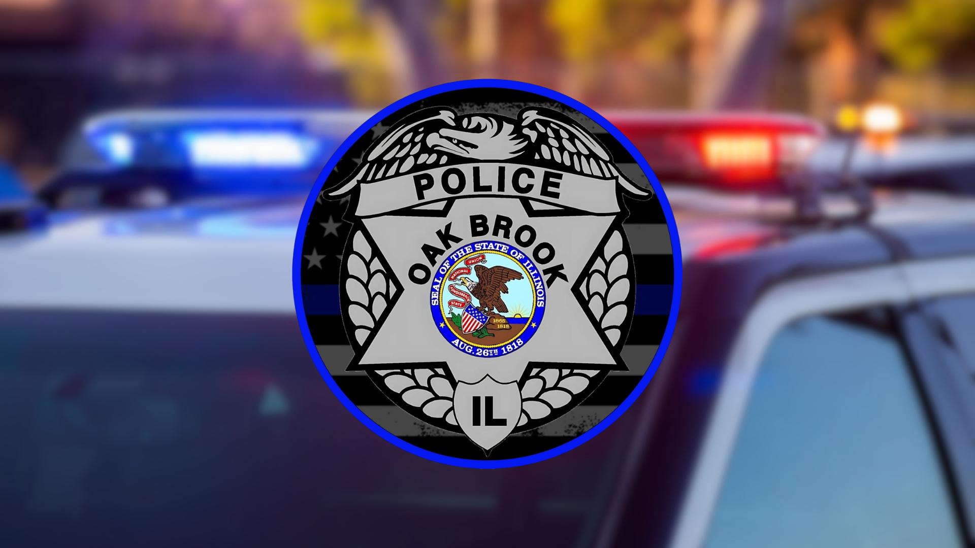 Oak Brook IL Police Badge logo on blurred police cruiser background.