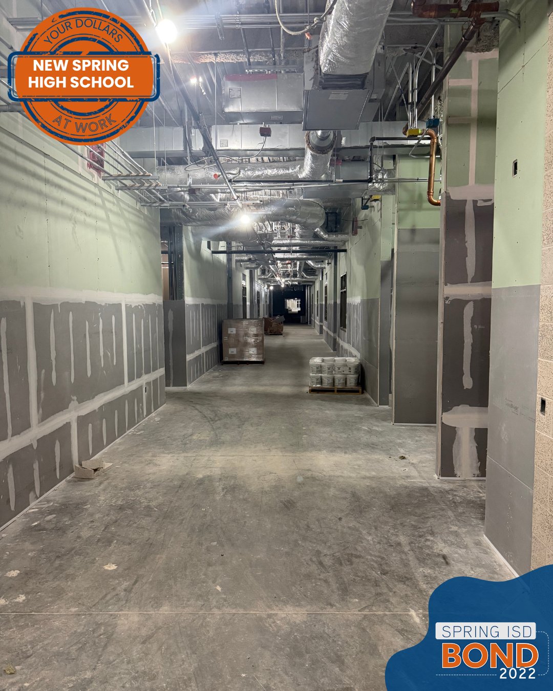 Empty hallway under construction for high school in Spring TX.