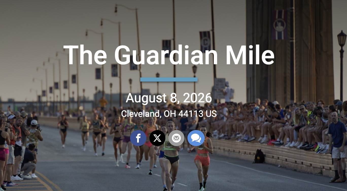Runners racing across Cleveland's Hope Memorial Bridge during the Guardian Mile, with spectators lining both sides of the road.