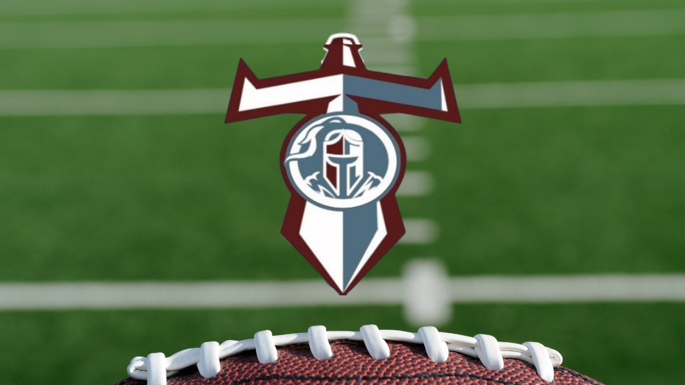 The Legacy School of Sport Sciences athletics logo on blurred football field background