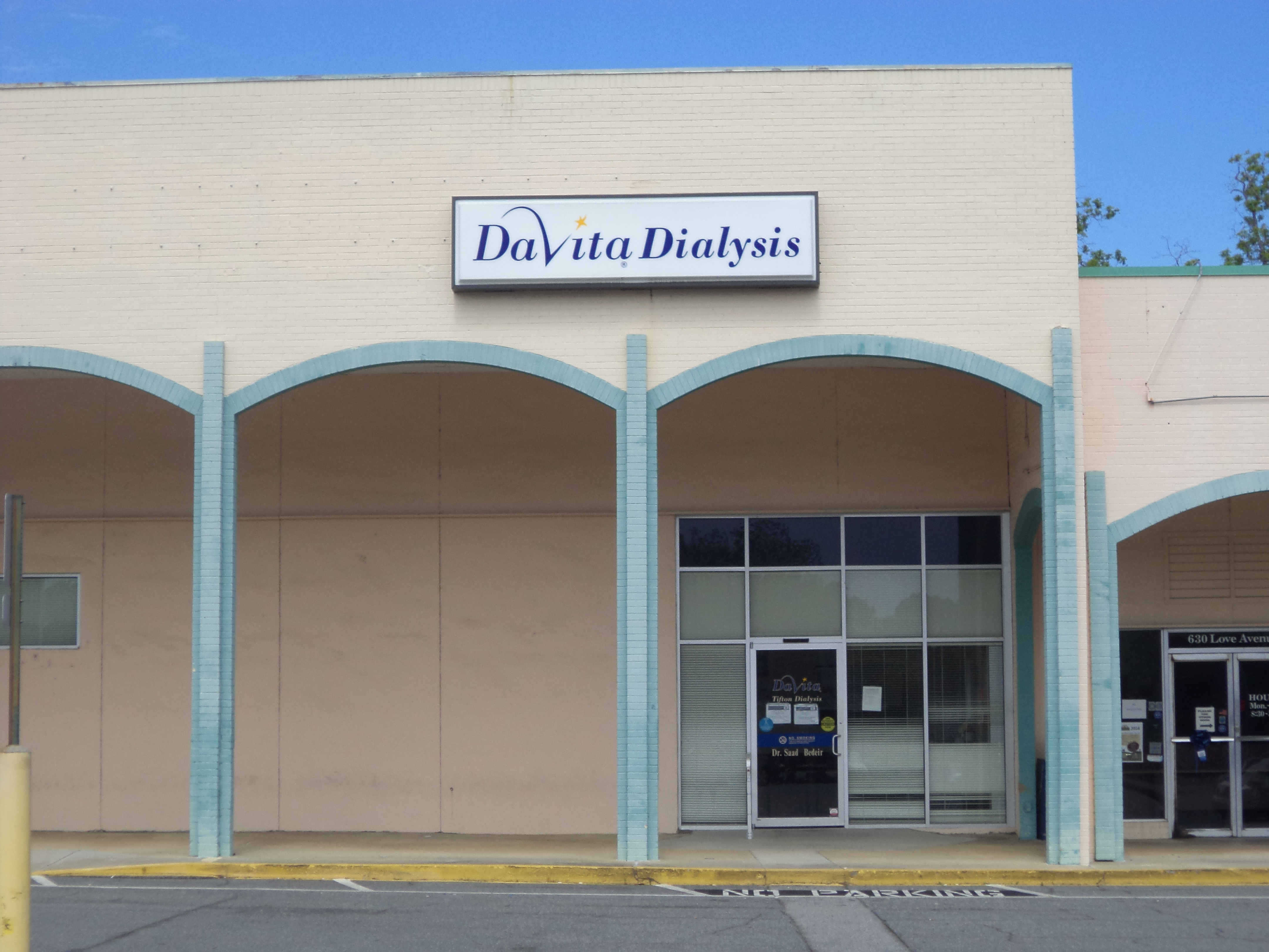 Exterior of a DaVita Dialysis clinic with a large sign above the entrance.