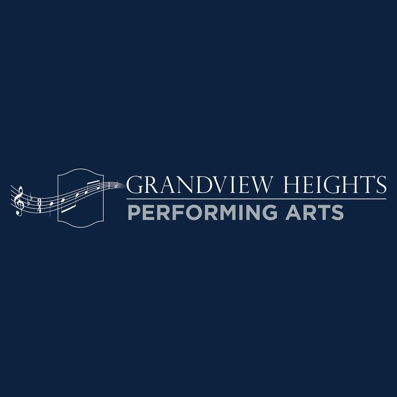 Shield-shaped logo with musical staff and notes for a performing arts department.