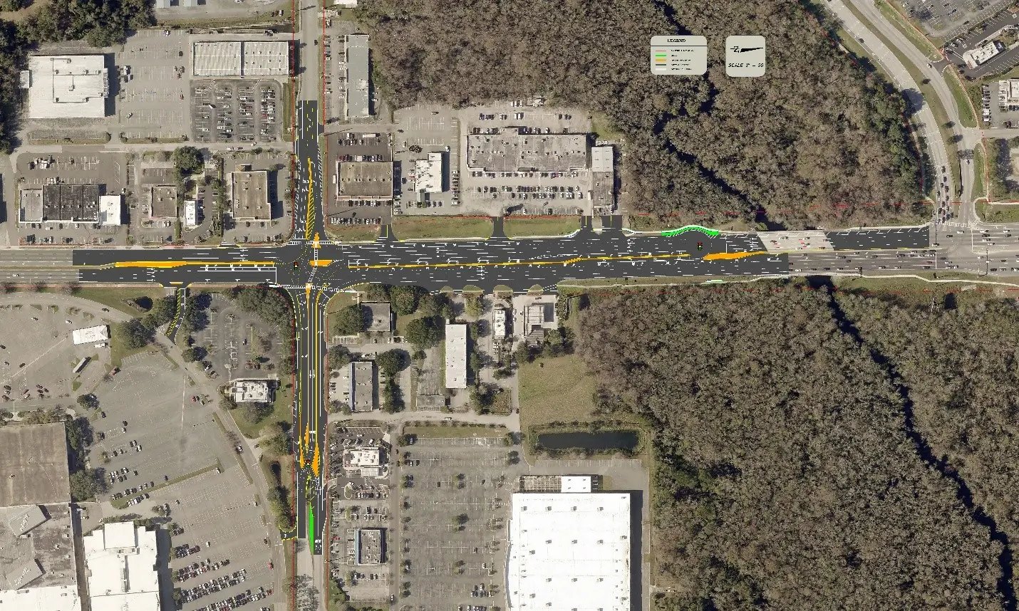Aerial map of a road intersection with colored lane markings showing traffic flow changes.