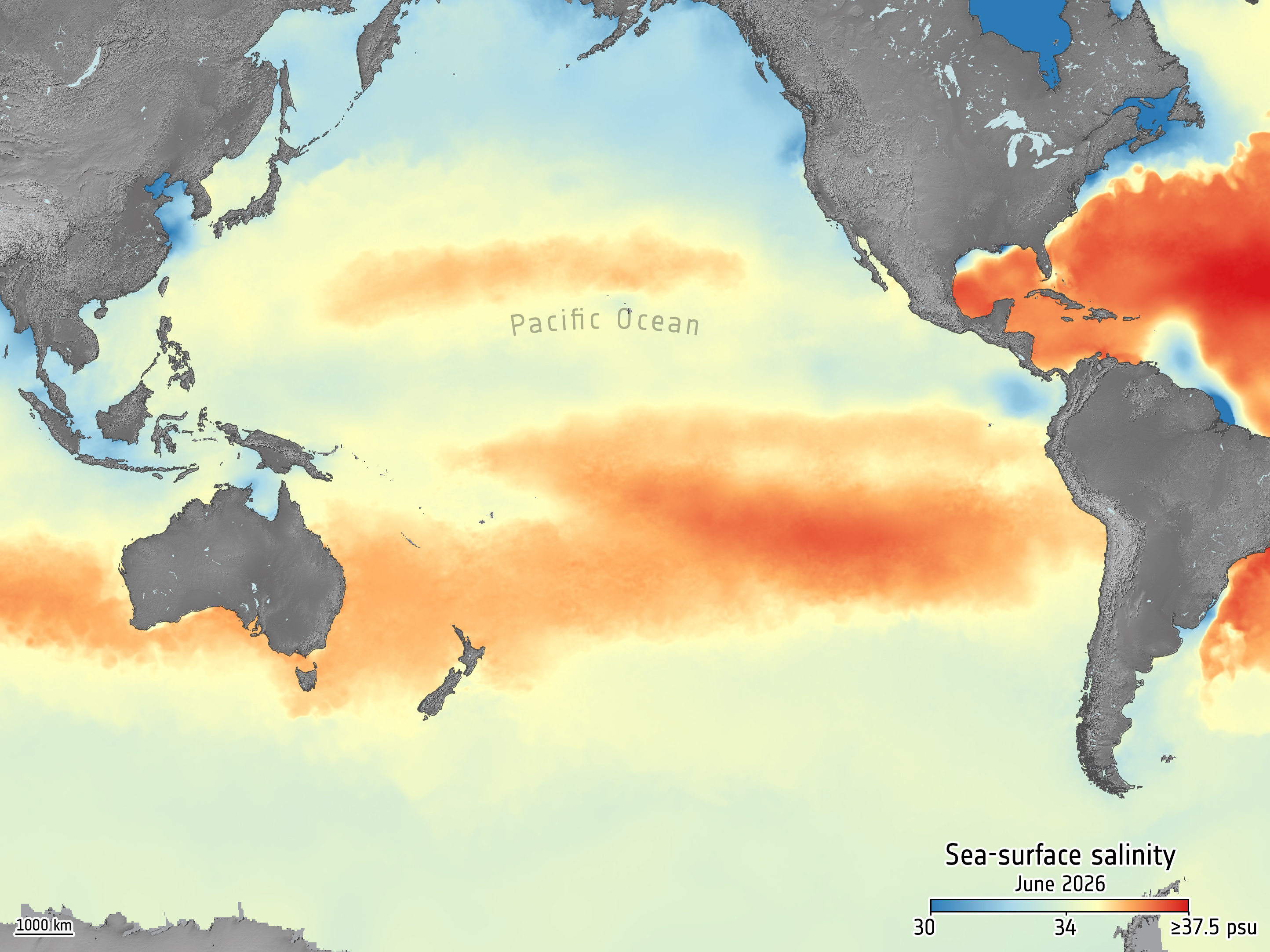 Color-coded satellite map of the Pacific Ocean showing sea-surface salinity levels in shades of blue, green, and red.