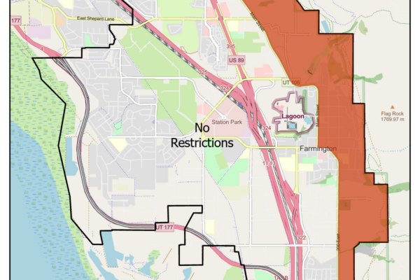 Map of Farmington showing a red-shaded restricted zone east of a boundary line.