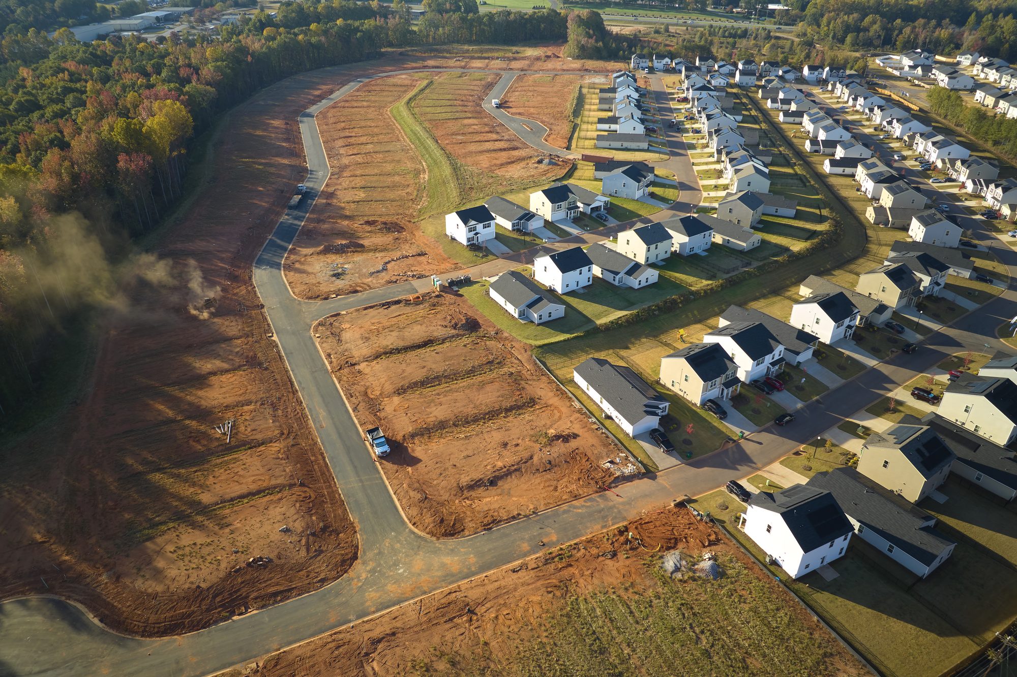 Aerial view of construction site with new tightly packed homes in South Carolina. Family houses as example of real estate development in american suburbs