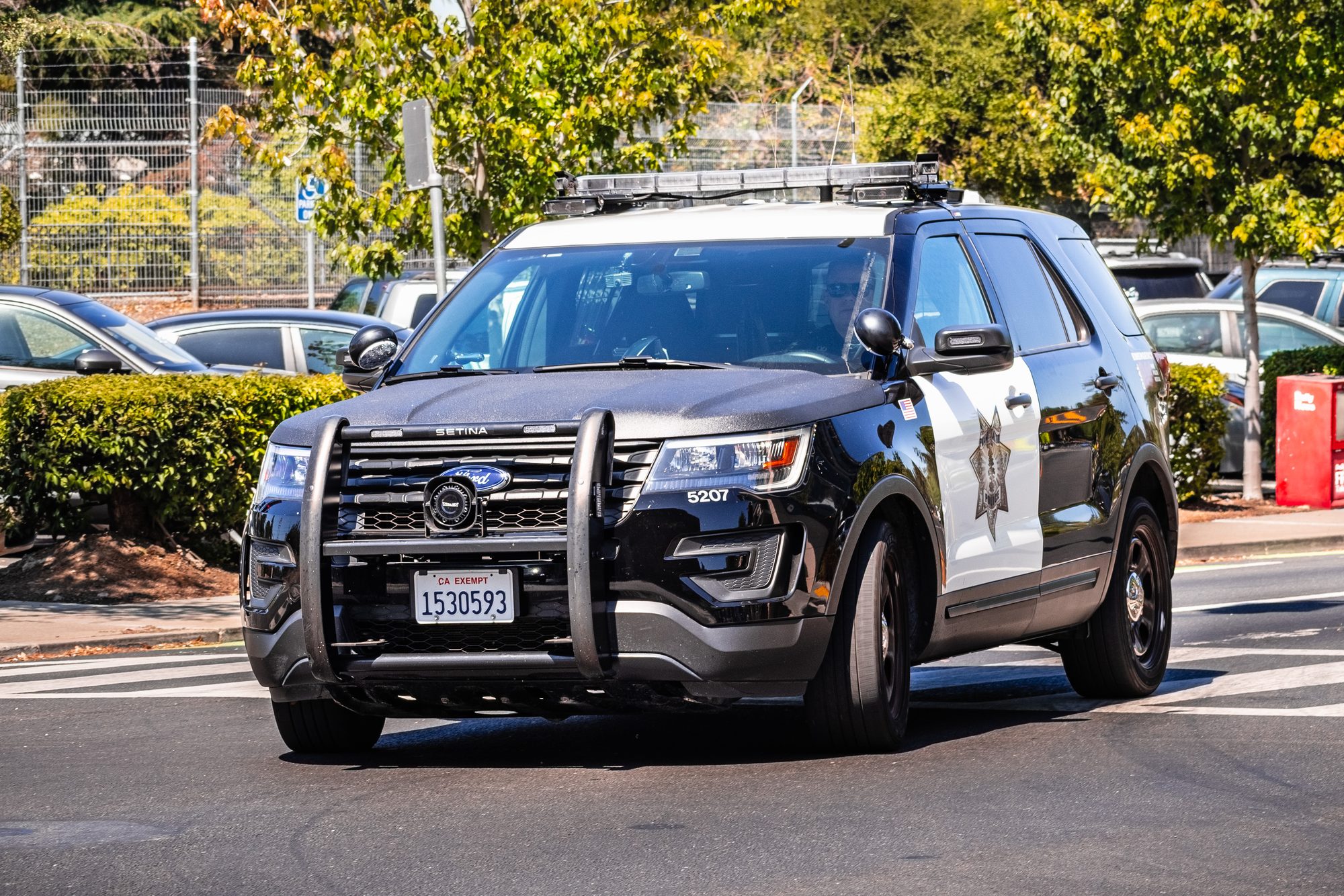 Police car driving on the street, Palo Alto, California
