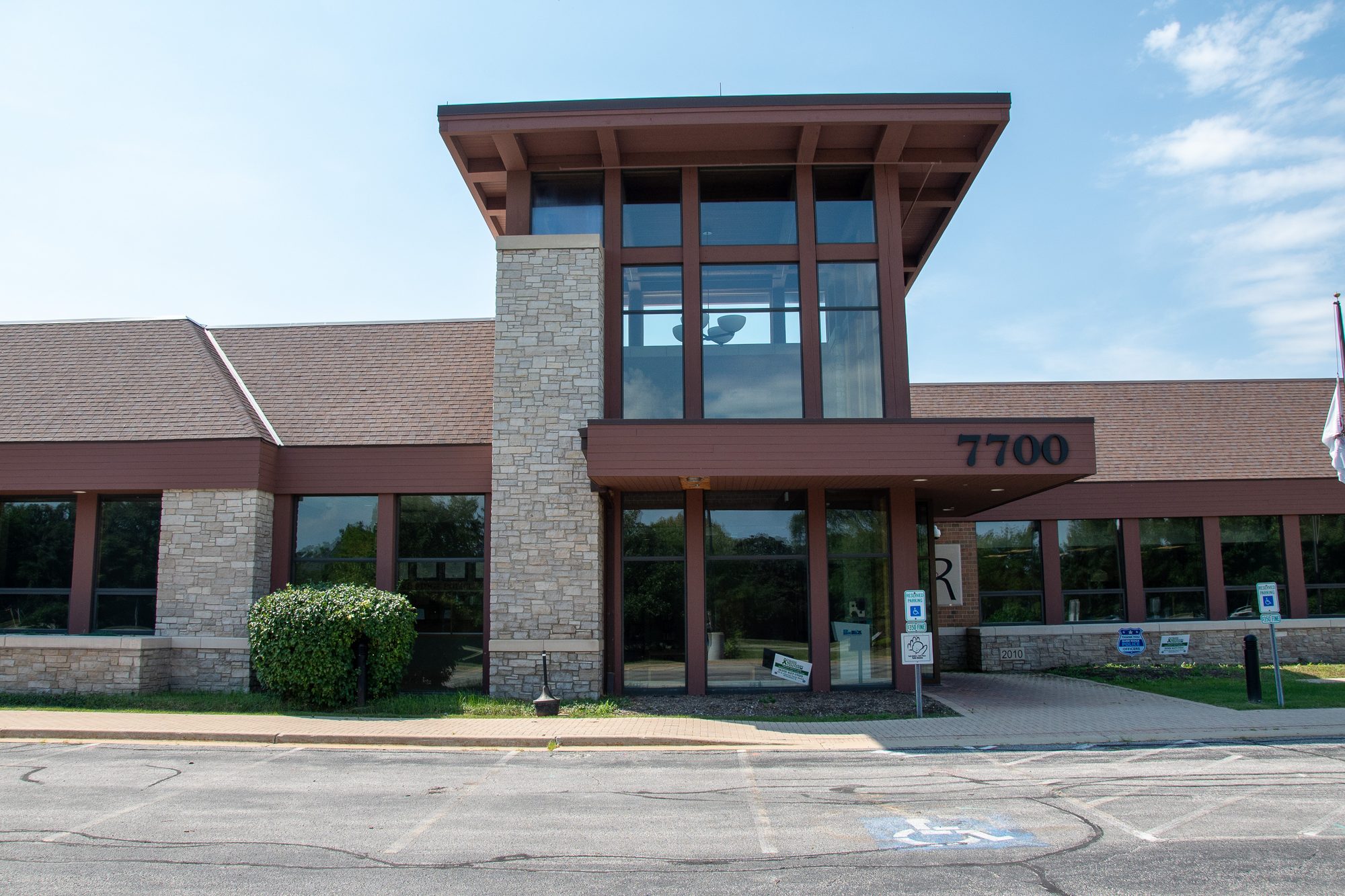 Exterior facade and entrance of the Burr Ridge Police Department building.