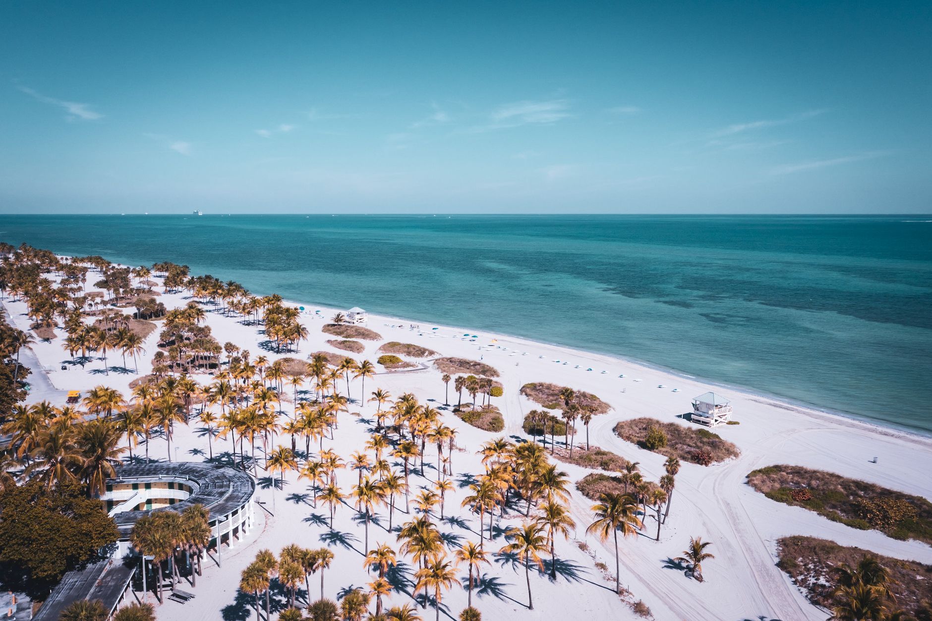 A sandy beach shoreline in Key Biscayne, Florida.