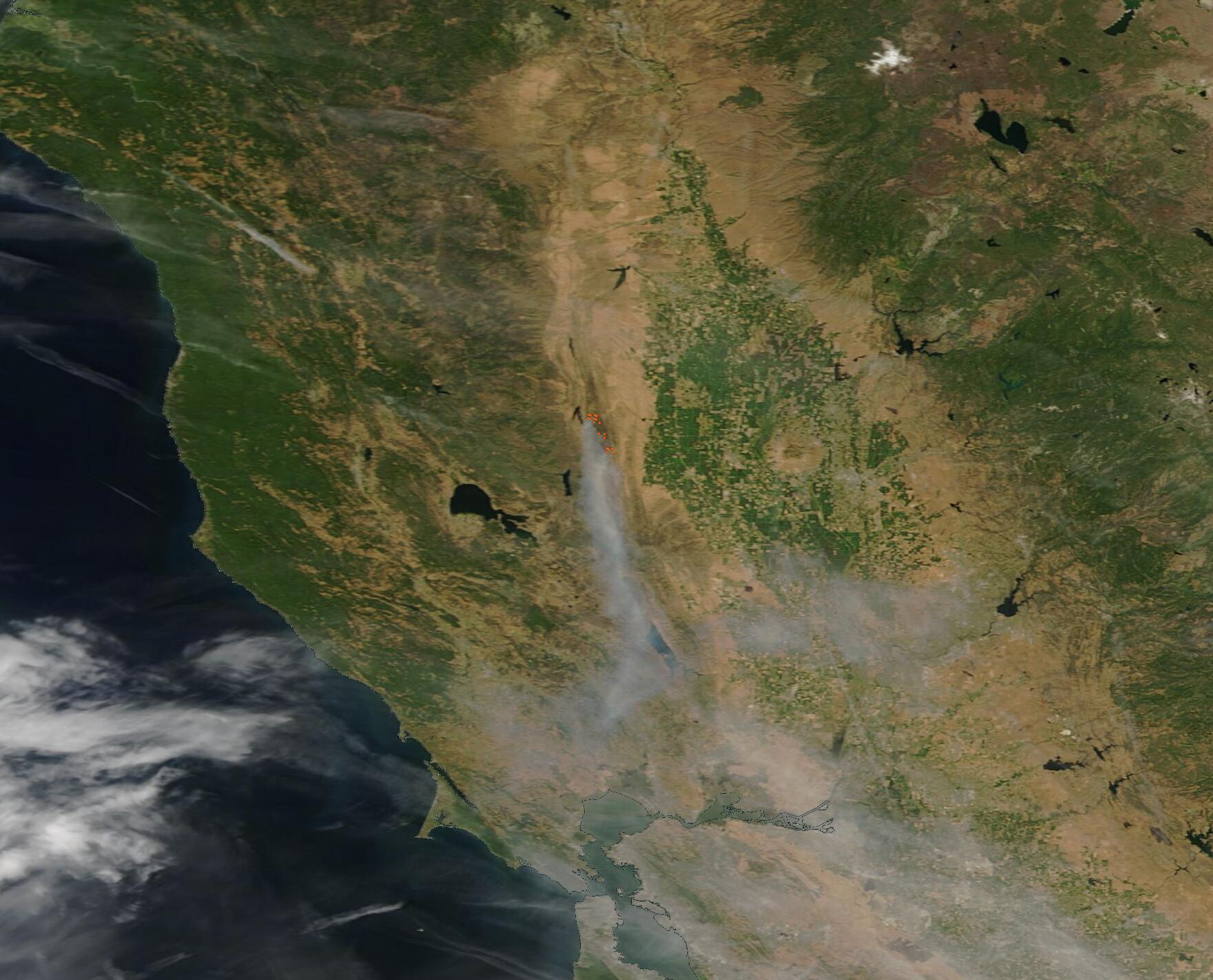 Satellite view of California showing a wildfire smoke plume drifting south toward the Bay Area.