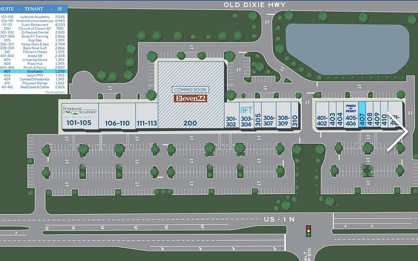 Color-coded site plan of a shopping center showing a labeled undeveloped lot between retail buildings.