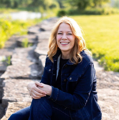 susan smentek headshot sitting rocks