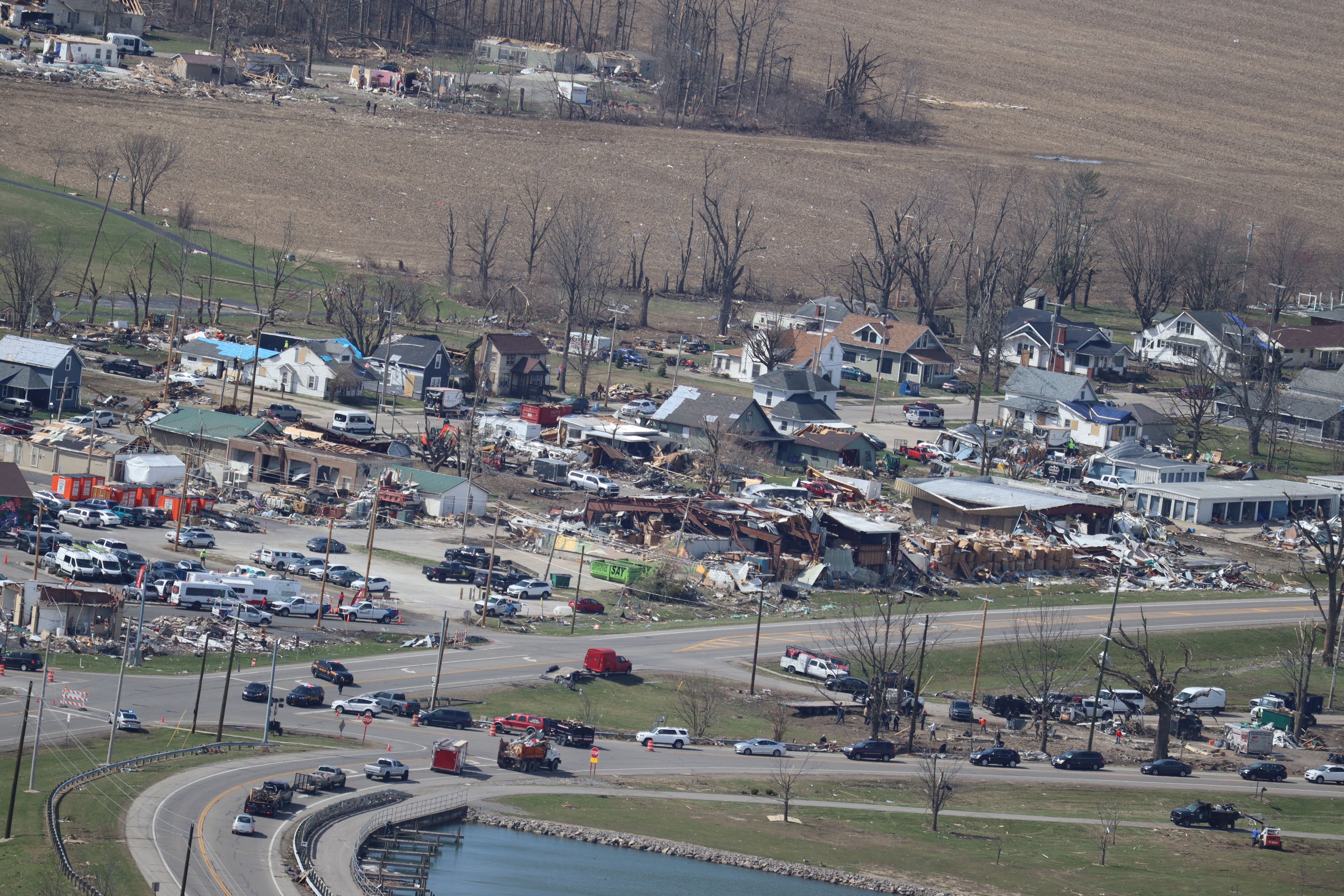 Aerial view of a small Ohio town with destroyed buildings and debris after a storm.