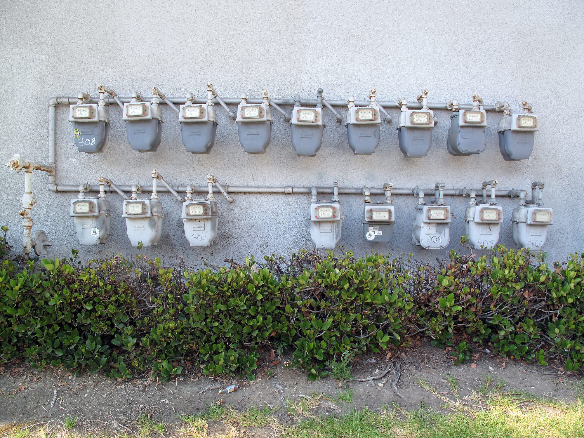Natural gas meters on an outside wall of an apartment complex, Koreatown, LA