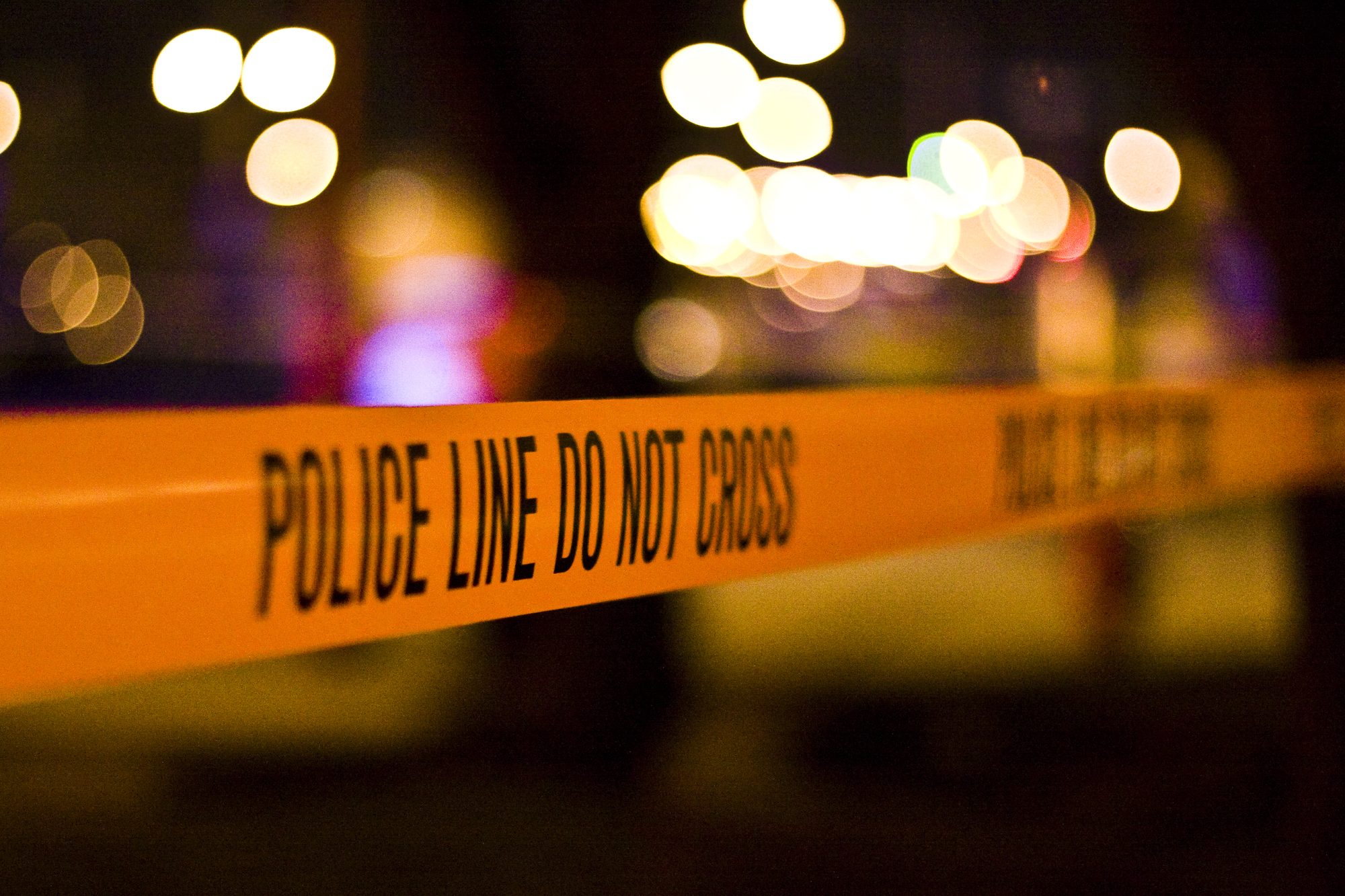 A police line (police tape) established at the scene of a car crash in the Cedar-Riverside neighborhood of Minneapolis, Minnesota.