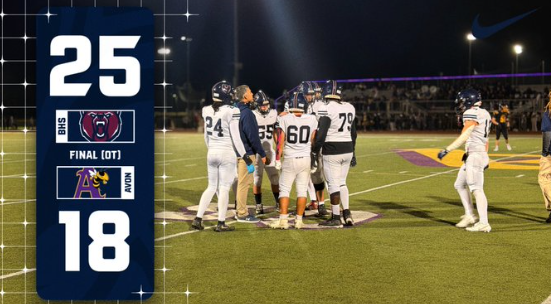 Football players gather on the field beside a graphic showing Berkley’s 25–18 overtime victory over Avondale.