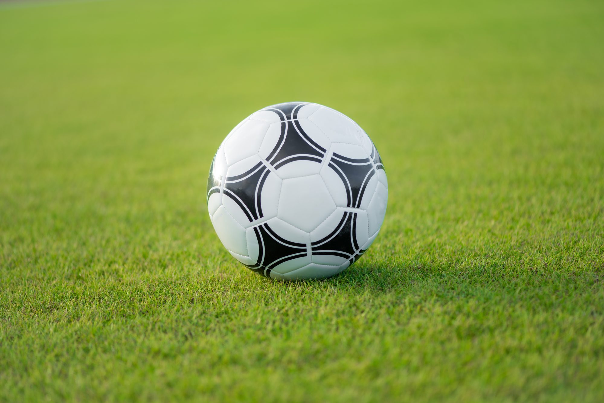 A soccer ball on a field.