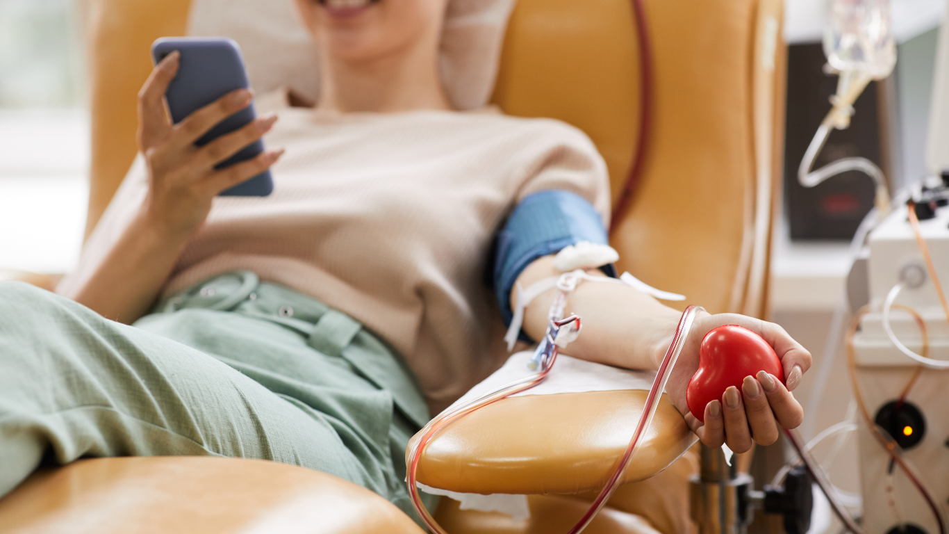Woman in hospital gets blood drawn.