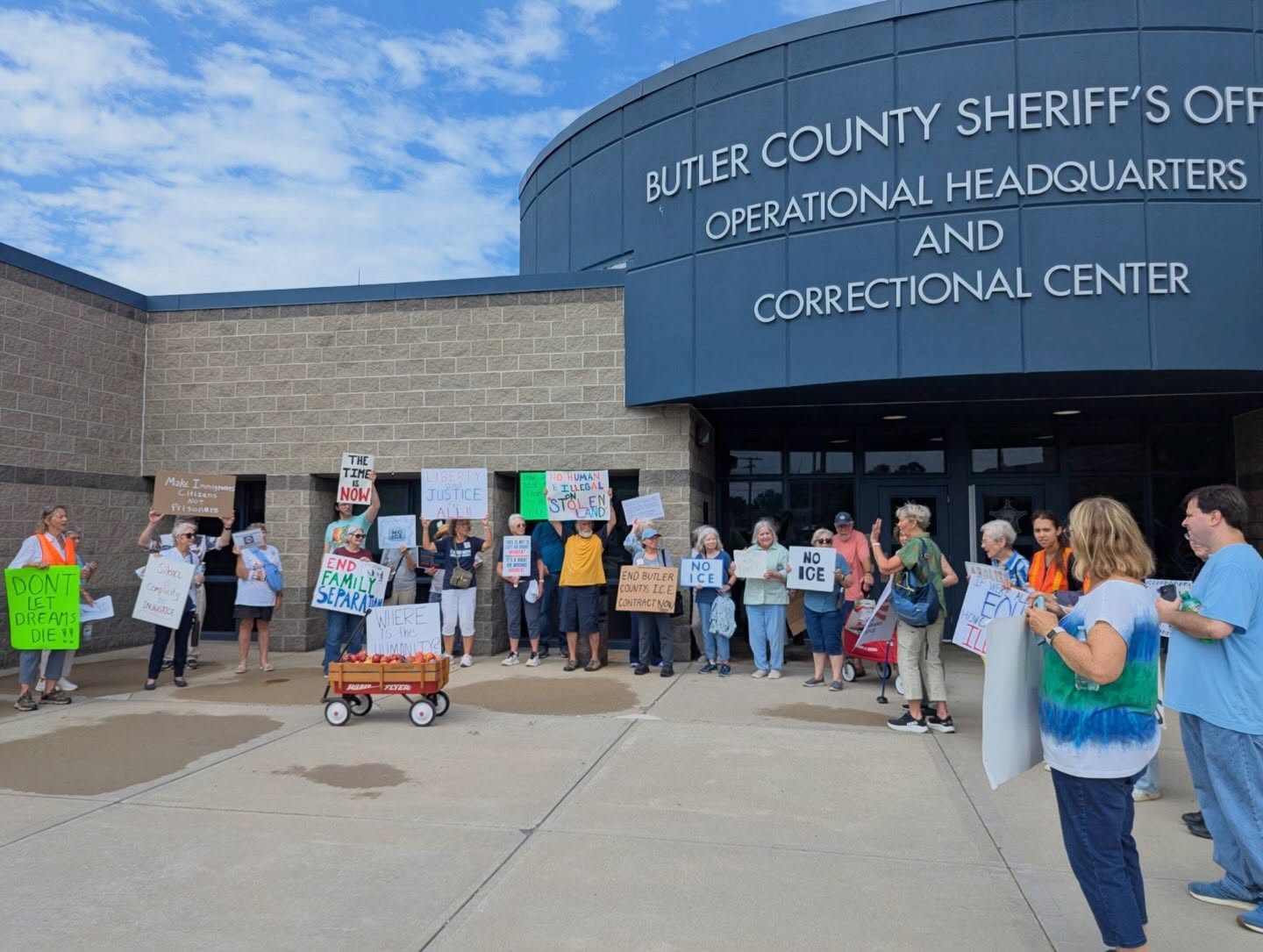 protesters standing outside the Butler County Detention Center