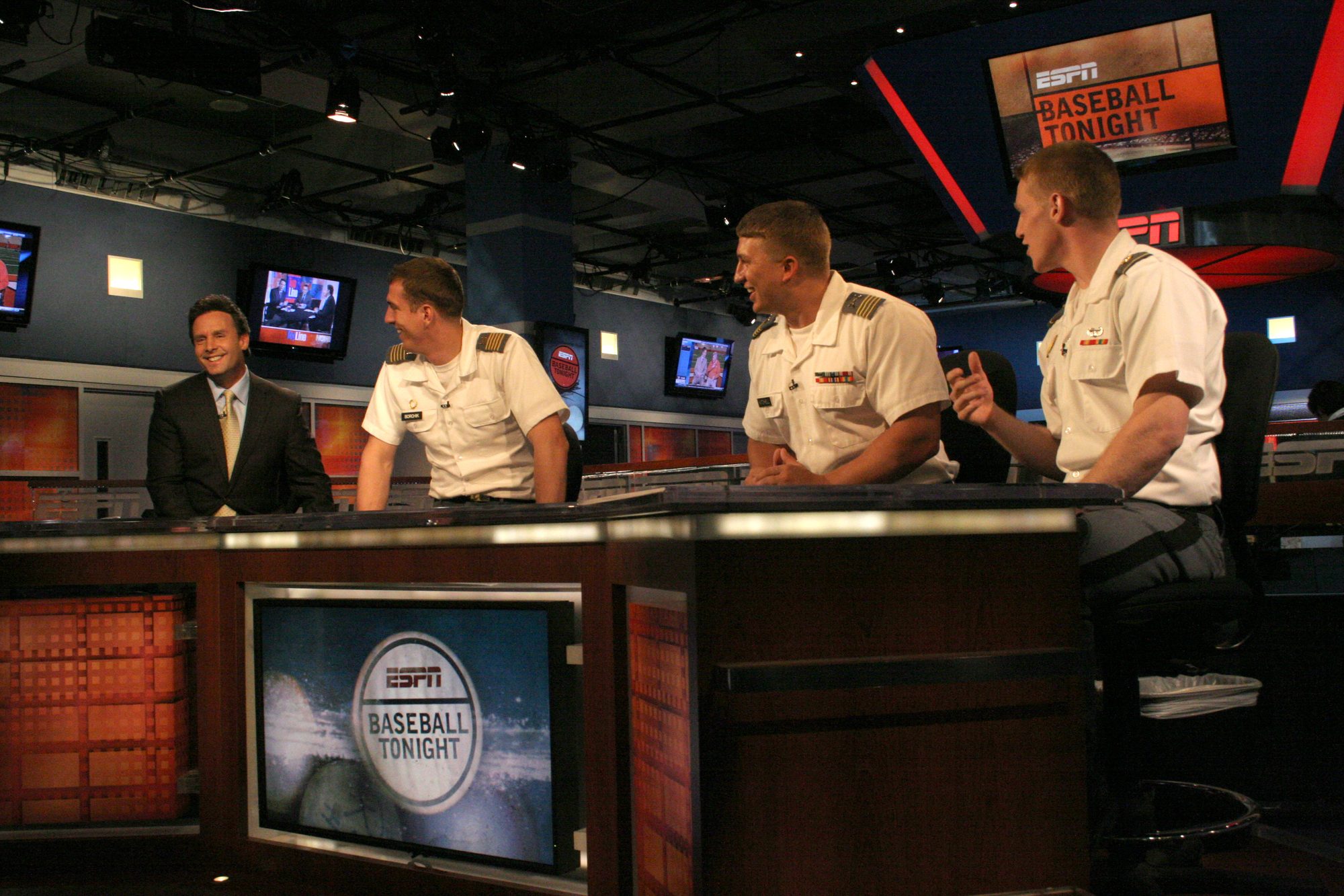 Karl Ravech, host of "Baseball Tonight" is joined by West Point Cadets Jason Borchik, Matt Kitchell and Justin Weeks in the ESPN studio as 29 cadets toured the headquarters of the sports network in Bristol, Ct., on March 31. Photo by Mike 




This image has an extracted file: Karl Ravech 2011.jpg.