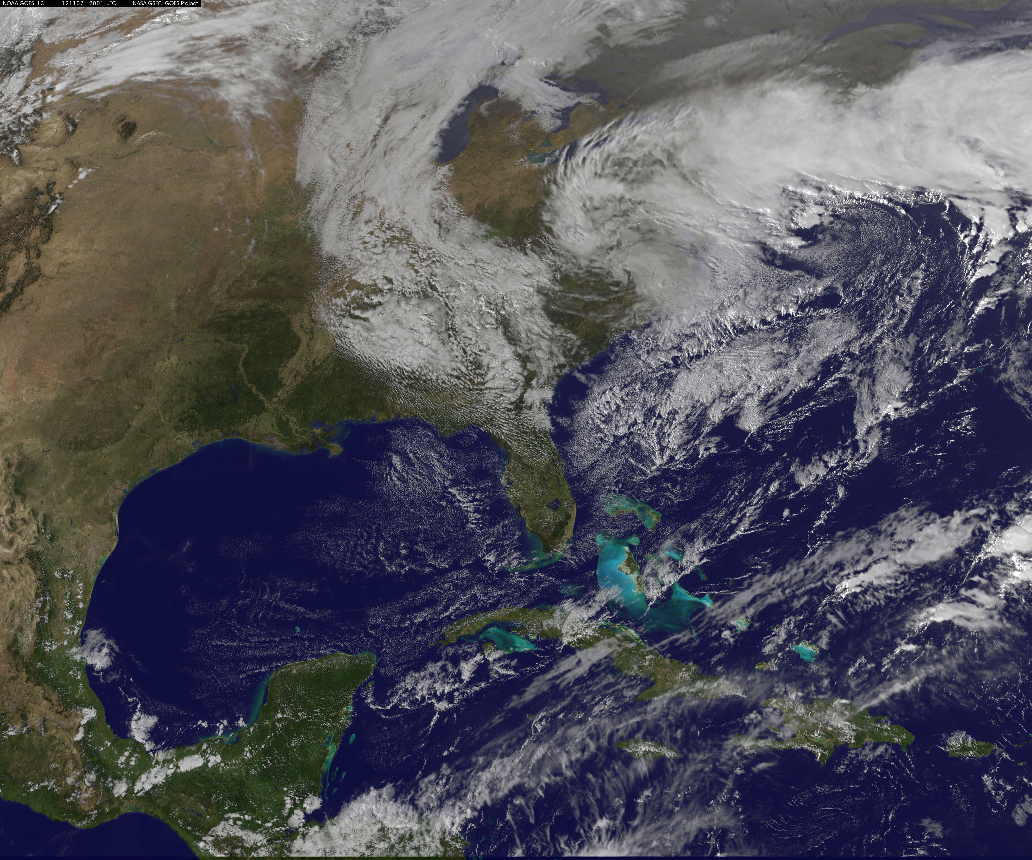 Satellite view of a nor'easter cloud system blanketing the eastern U.S. coastline.
