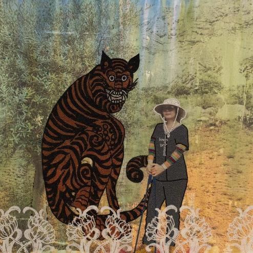 Mixed-media painting detail showing a beaded tiger and a woman with a walking stick against a painted forest background.