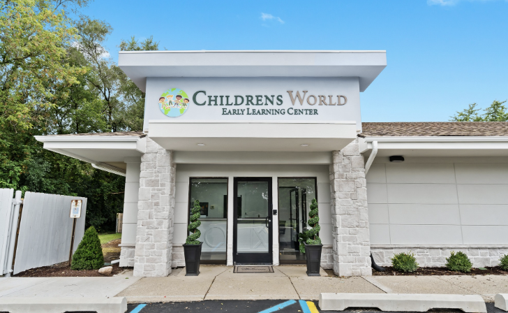 Exterior entrance of Children’s World Early Learning Center in Canton Township, with the center’s sign above the front doors.