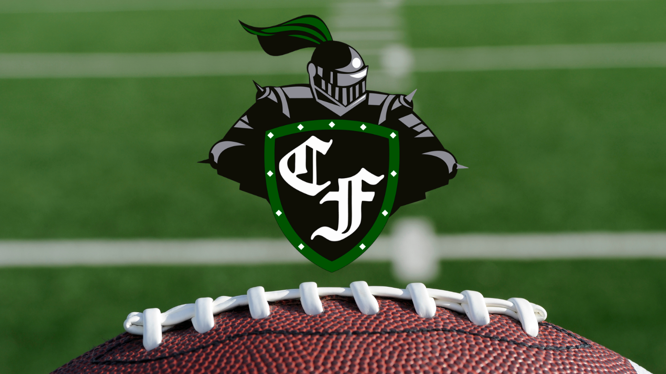 Clear Falls knight high school football logo on football with turf backgrounf