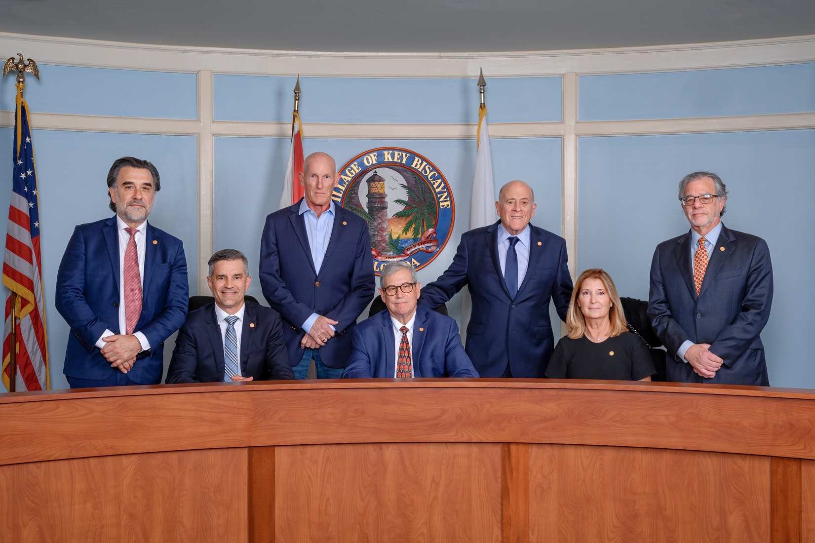 Key Biscayne Village Council members pose behind the dais in the council chamber.