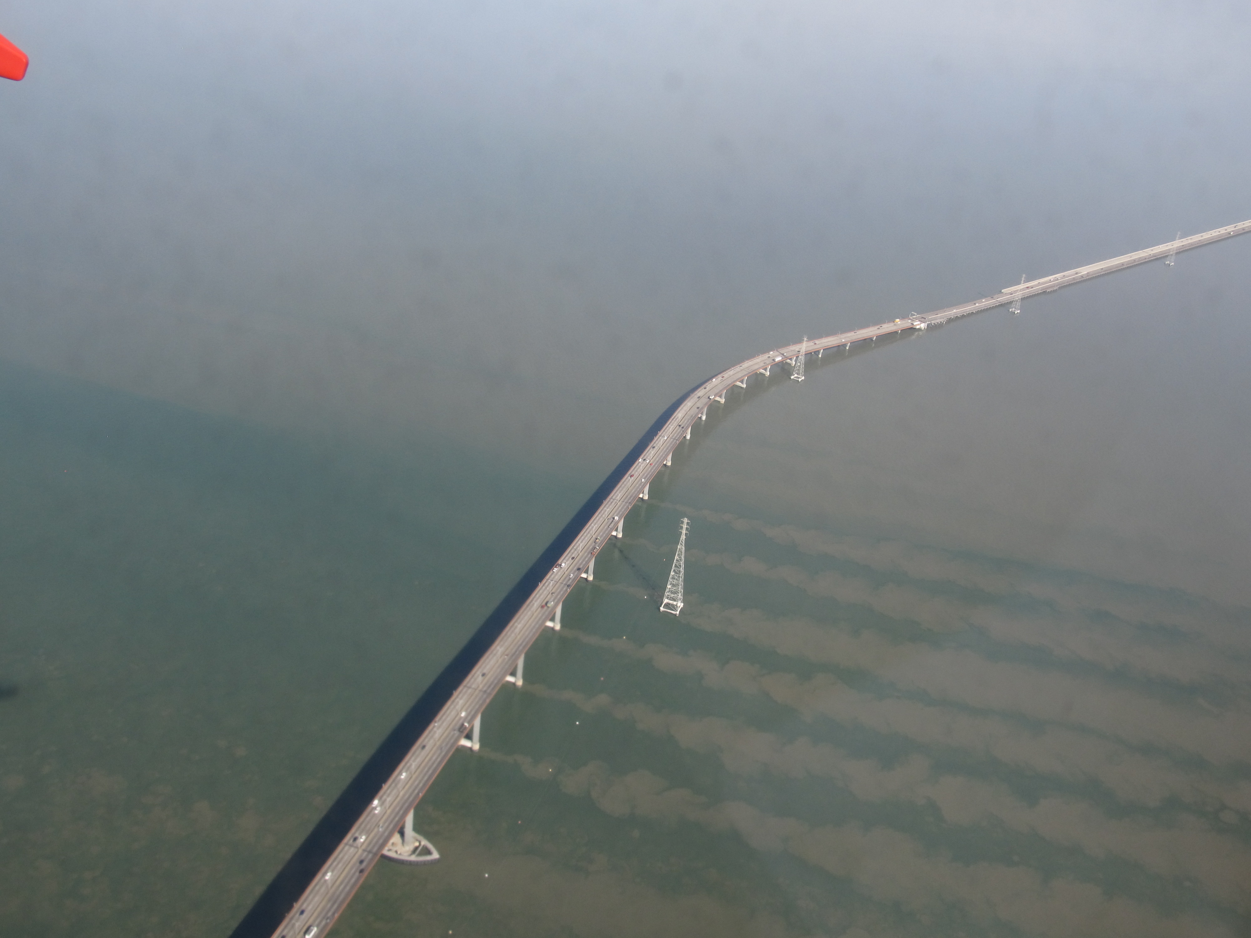 Aerial view of the San Mateo Bridge spanning San Francisco Bay.