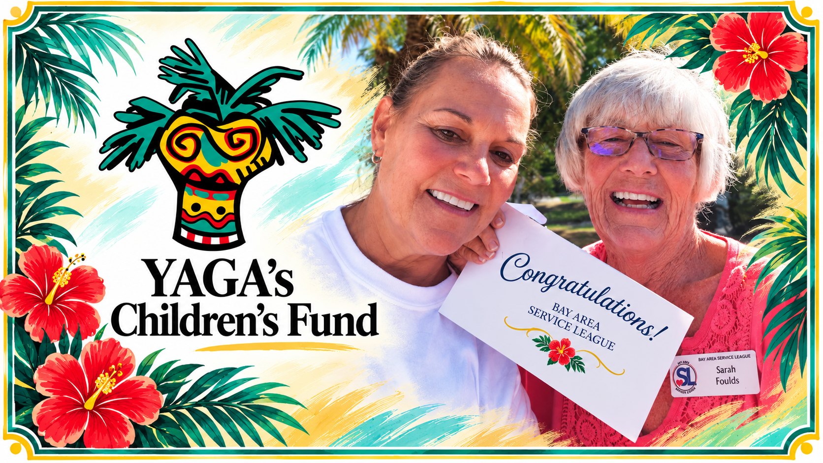 Two smiling women pose together, one holding a congratulations card, in front of a fund logo.