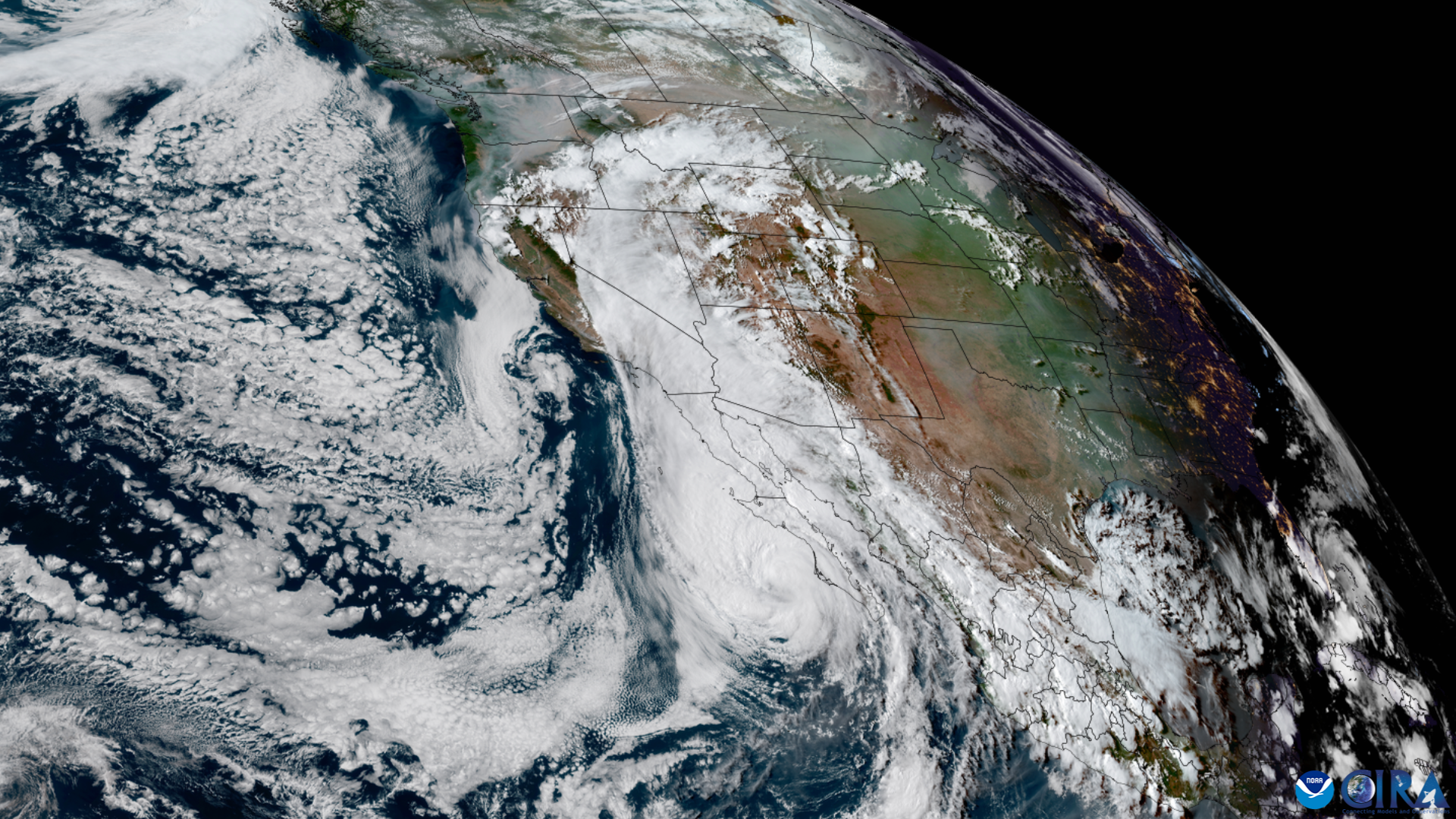 Satellite view of a large hurricane approaching the Baja California and California coastline.