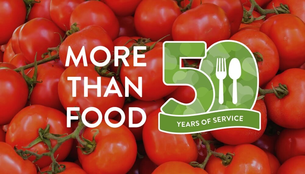 Promotional graphic with '50 Years of Service' badge and 'More Than Food' text on a red tomato background.