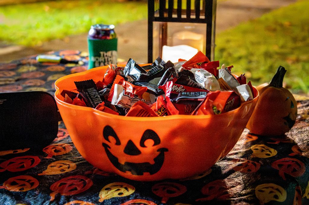 A bowl of Halloween candy is displayed for trick-or-treaters.