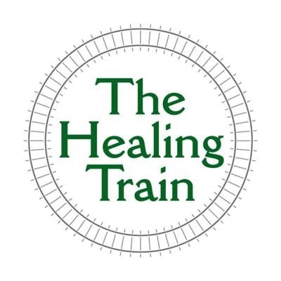 Circular green logo reading The Healing Train with a decorative border.
