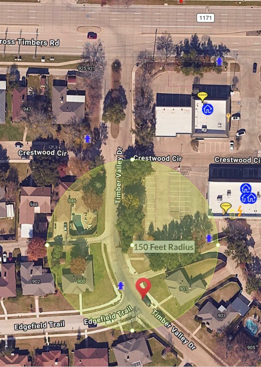 Aerial map showing a 150-foot radius circle around a pin at a residential street intersection.