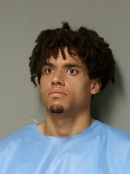 Booking photo of Edward Joseph Smith, 23, who was arraigned on an open murder charge in the fatal stabbing of Daniel Lusk on the Lansing River Trail.
