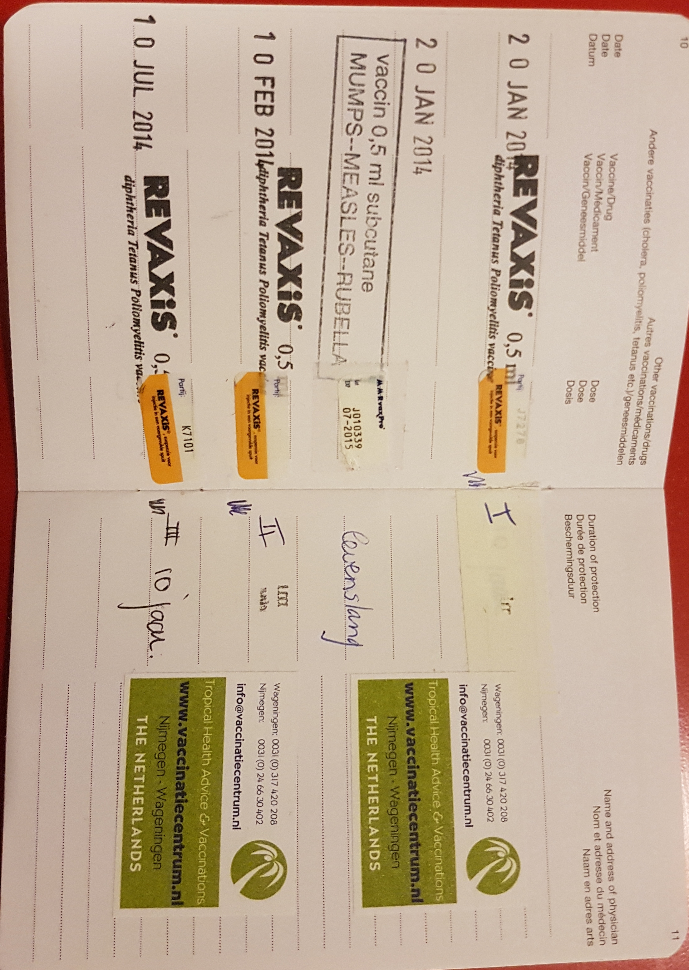 An open vaccination record booklet showing MMR and other vaccine entries.