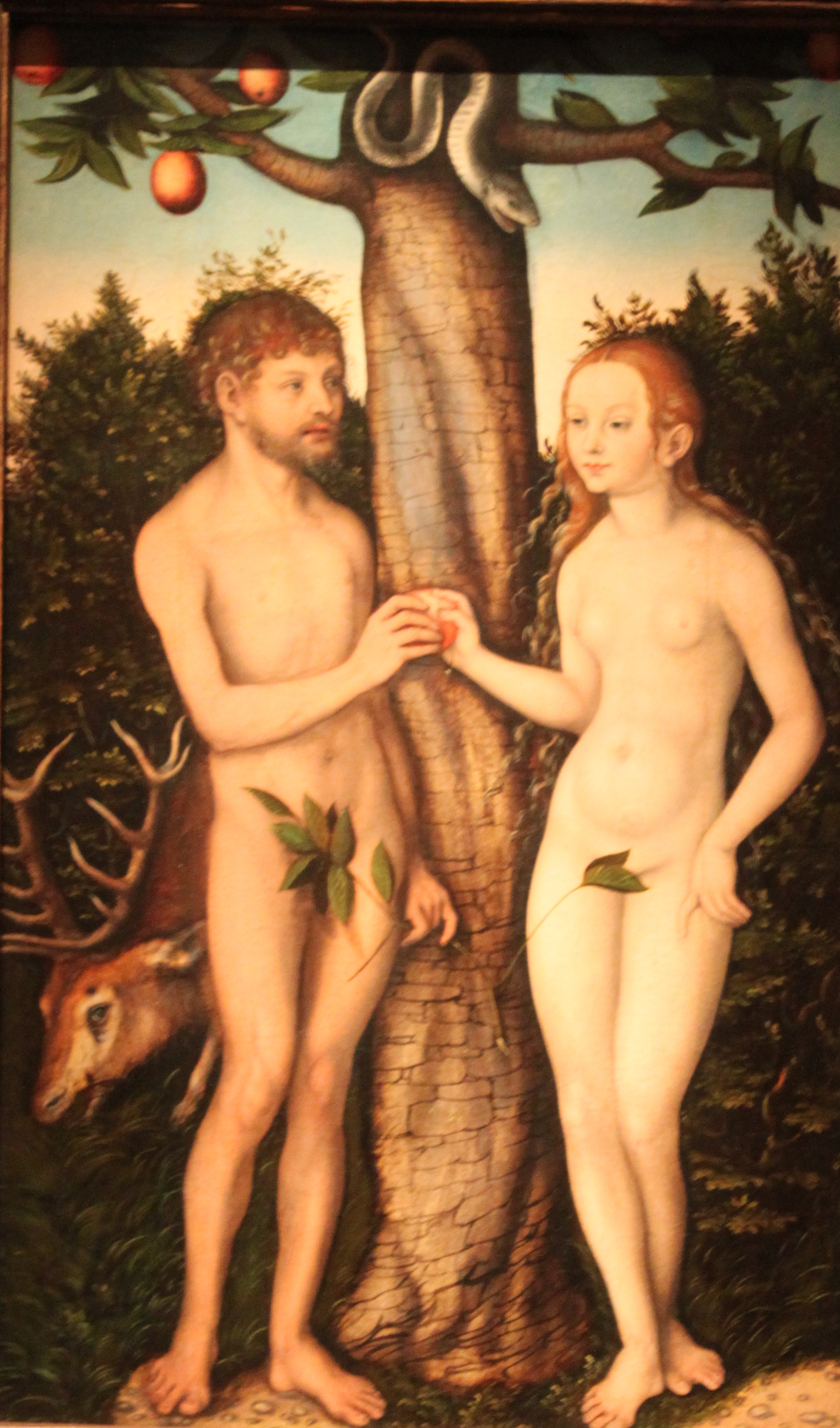 Renaissance painting of two nude figures flanking a tree with a serpent, in Northern European style.