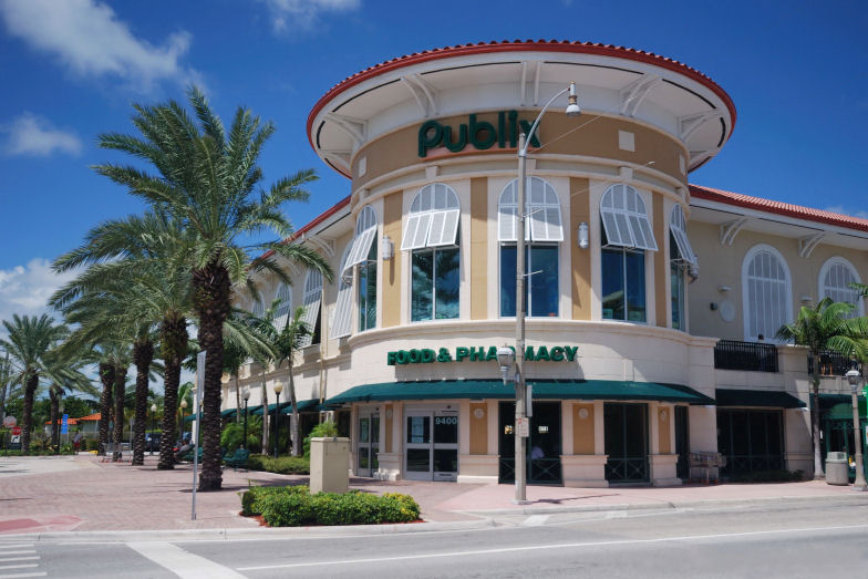 A Publix grocery store on a corner lot along Harding Avenue in Surfside, Florida.