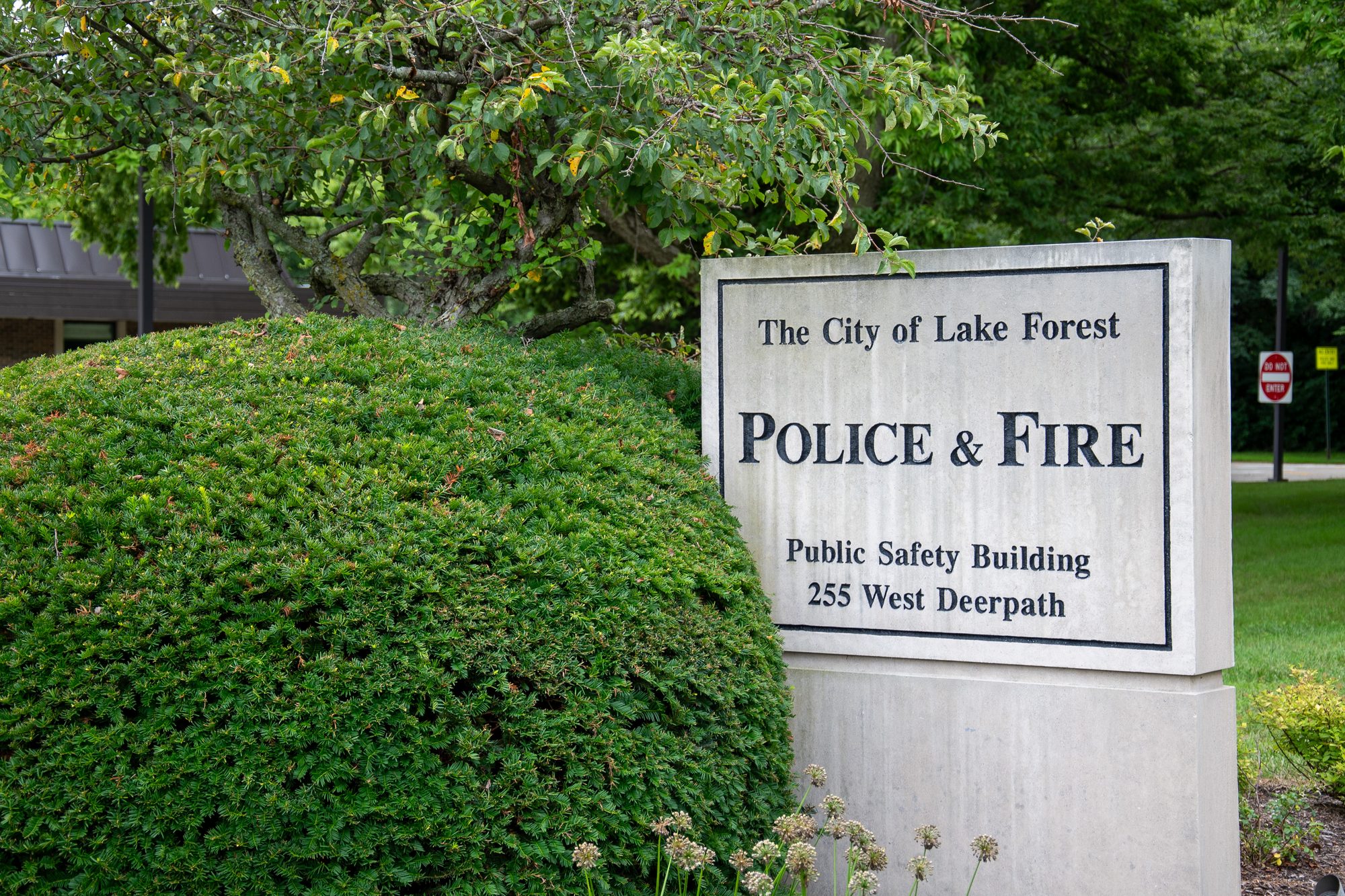 Stone monument sign for a city police and fire public safety building outdoors