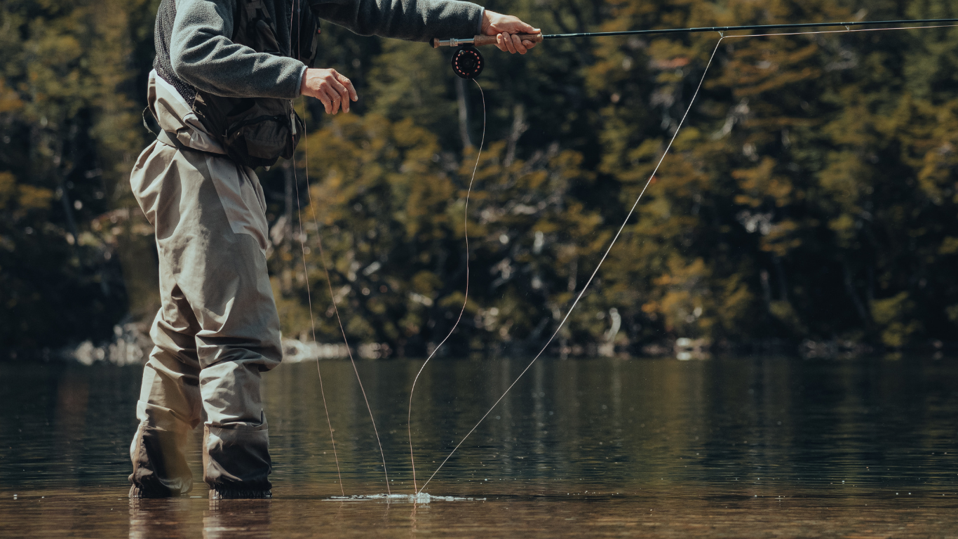 Man fly fishing on river