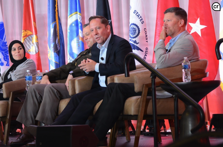 U.S. Army DEVCOM Ground Vehicle Systems Center Director Michael Cadieux answers questions alongside fellow Detroit Arsenal senior leadership during a panel at the 18th annual GVSETS symposium in Novi, Michigan.